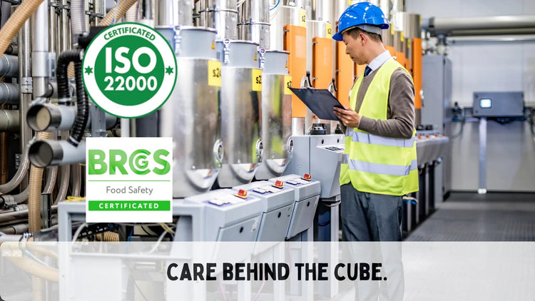 man looking at machinery and standards