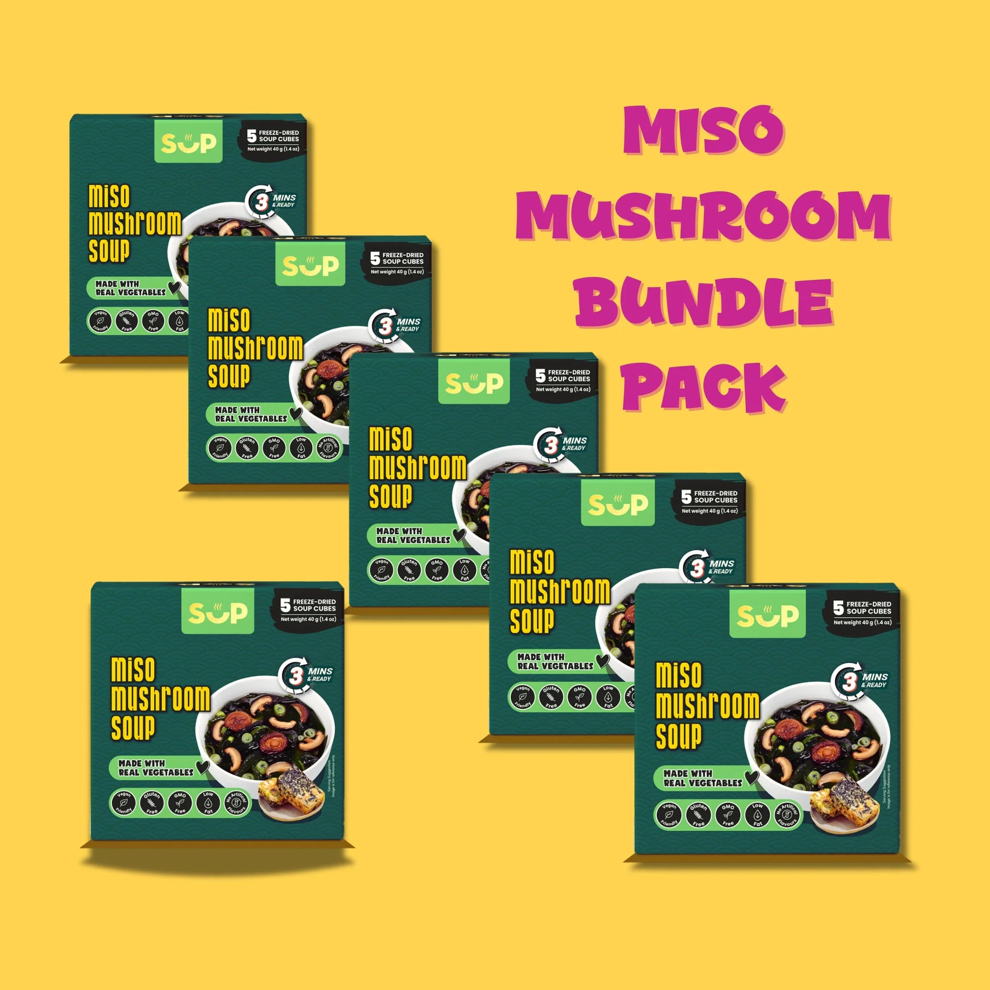 Miso mushroom soup bundles with green packaging on yellow background, freeze-dried soup cubes