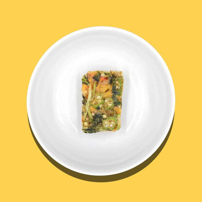 Sweet and sour vegetable block on a white plate with yellow background